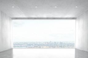 Фотообои Пустое помещение с панорамой на мегаполис